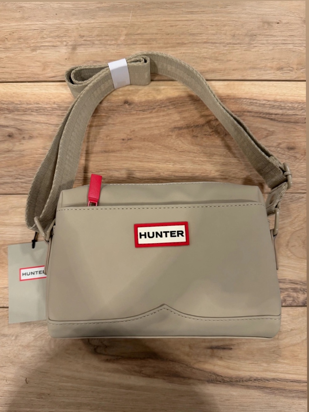 Hunter Beige Crossbody Bag with Red Logo Accent